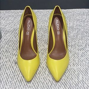 Bright yellow pointy toe heels